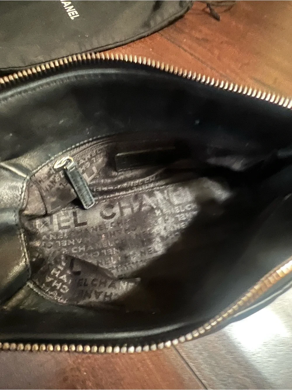 CHANEL Black Quilted Leather Shoulder Bag with Chain Strap and CC Logo